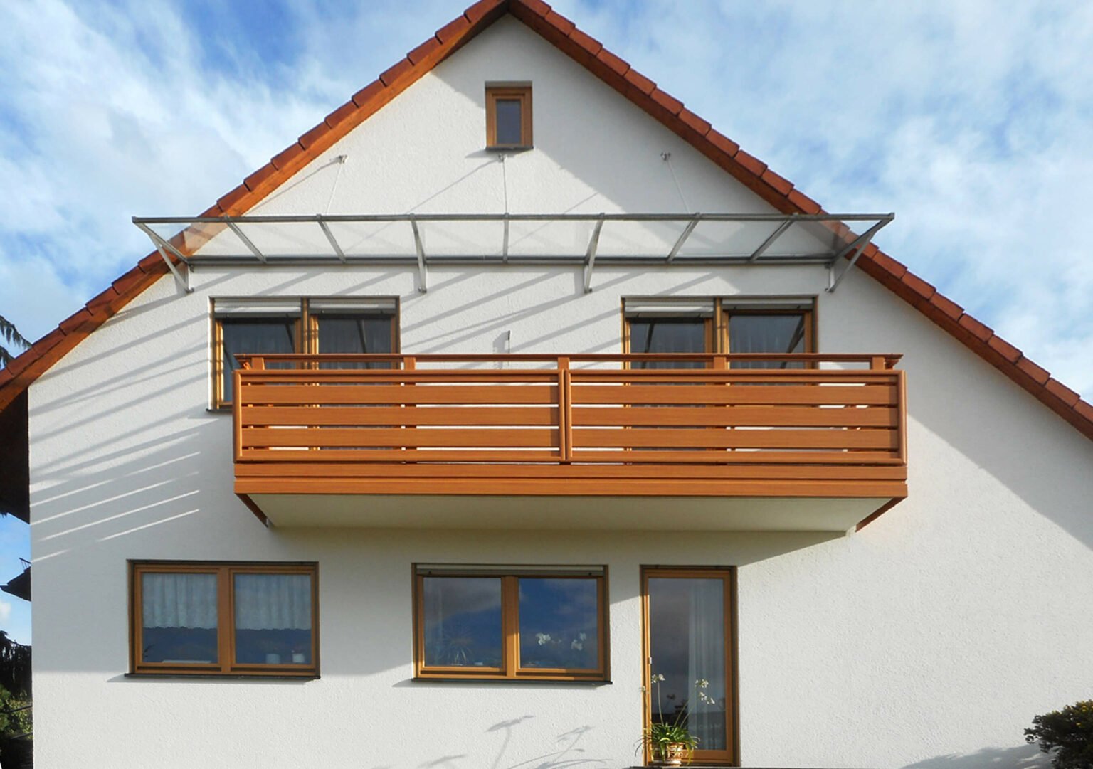 Balkonüberdachung aus Glas mit Alu Select Turin Balkongeländer